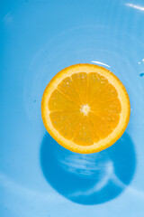 Cool splash orange slice in summer