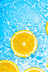 Cool splash orange slice in summer