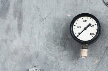 pressure gauges on a gray surface. vintage appliances