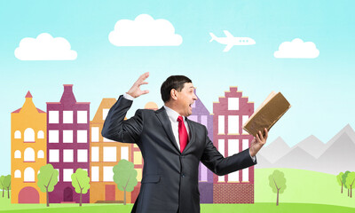 Expressive businessman looking in open book