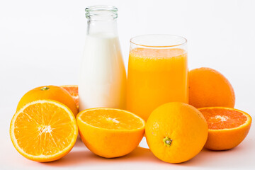 Obraz na płótnie Canvas Fresh fruit milk orange juice drink