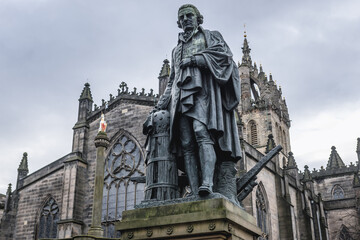 Monument to the Adam Smith in front of Saint Giles cathedral in the Old Town of Edinburgh city,...