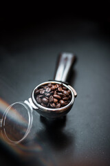 the coffee beans in to the coffee tamper