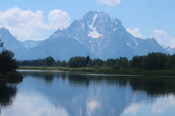 Reflective lake and Mount Moran in the Tetons