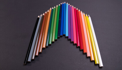 Colorful pencils close up shooting and Back to School Concept with Stationery and Blackboard