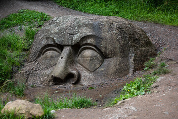 Fototapeta na wymiar Head of ancient statue