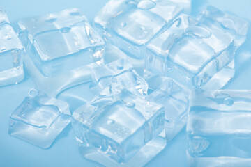 Cool and transparent ice cubes in summer