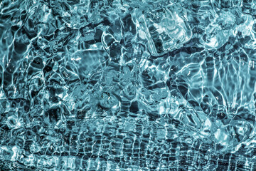 Summer ice crystal clear water ripples