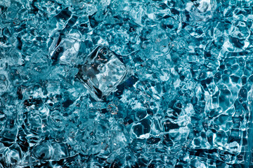 Cool and transparent ice cubes in summer