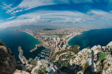 Breathtaking aerial view Calpe, Costa Blanca. Popular summer resort in Spain with mediterranean sea and Las Salinas lake, mountains at the background.