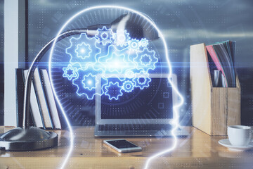 Obraz premium Multi exposure of work table with computer and brain hologram. Brainstorm concept.