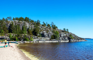 Mount Khiisi and the beach in front of it. Koyonsaari Island (eastern part). Ladoga lake. Karelia. Russia