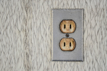 Two-hole socket on the wall.