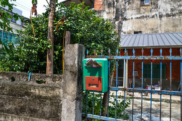 Yunlin, Taiwan - AGU 02, 2019: Green mailbox on the door.