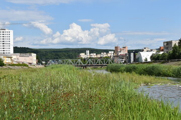 Fototapeta na wymiar City landscape with river