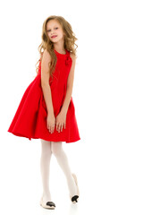 Full Length Portrait of Girl in Red Stylish Dress Posing in Studio