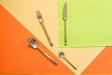 Kitchen background, a creative reinterpretation of a Mise en Place with steel cutlery placed on...