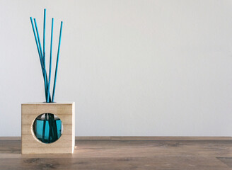 mikado blue wooden air freshener with white background