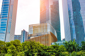 Obraz premium Look up at the magnificent modern city buildings