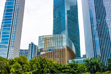 Obraz premium Look up at the magnificent modern city buildings