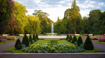 Flower arrangements in symetrical shapes leading up to a fountain in the city park Stadsparken in...