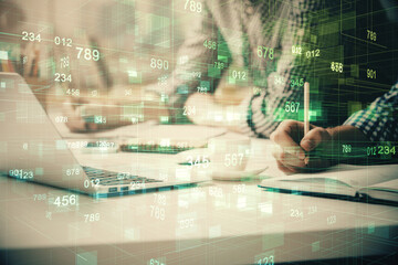 Businessman with computer background with technology theme hologram. Concept of hightech. Multi...