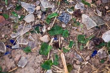 shards of broken glass on the ground