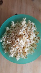 Popcorn in a green bowl