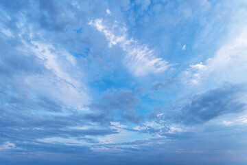 Blue sky with a pink tinge. Sky background.