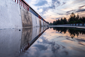 Fototapeta premium Asphalt road. Natural background. Sunset.