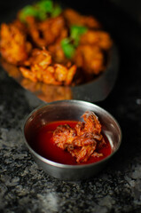 Crispy kanda pakora or kanda bhaji. Mumbai's road side snack. Favourite monsoon snack in India.