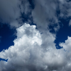 Abstract natural background, sky and puffy clouds,