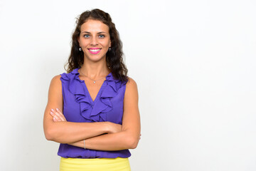 Fototapeta premium Portrait of young beautiful businesswoman with curly hair