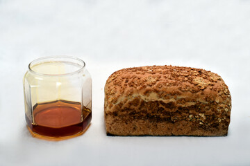 honey jar and big brad isolated on white background.