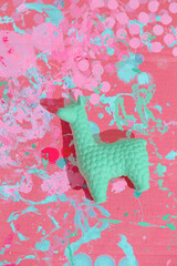 Abstract background spilled paint and lama. Minimal creative wallpaper. Pink aesthetic concept