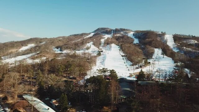 Aerial view of snowy mountain ski resort in Myoko, Niigata, Japan