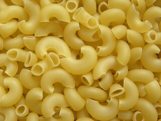 Yellow color raw dry Elbow Macaroni pasta