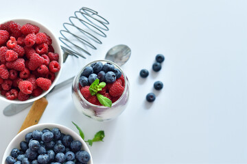Healthy food and breakfast. glass of delicious homemade smoothie, dessert made from chia and berries. delicious milkshake, vegan raw food. Summer card. Good morning.Selective focus.