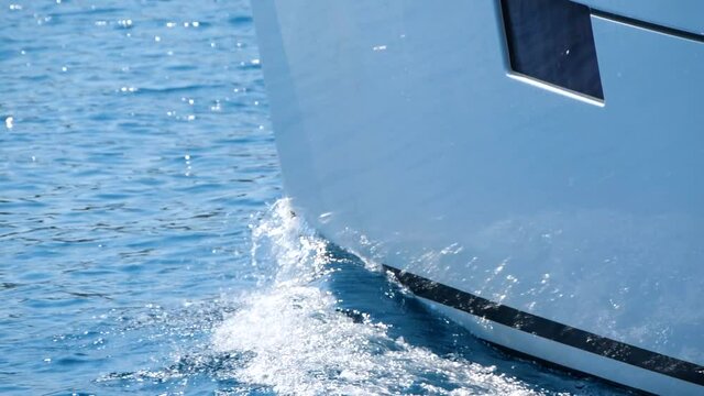 Sailing sailboat, yacht bow view. Regatta or sailing race at Mediterranean sea. 