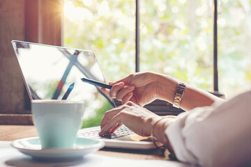 Hands young people work from home with laptop and drinking coffee in morning relax at home.  Businessman meeting conference connect online with office. 