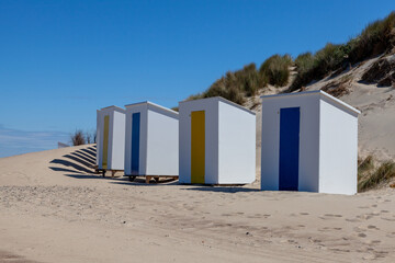 Obraz na płótnie Canvas colorful beach huts at Cadzand