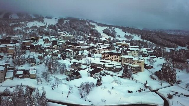Aerial view of snowy mountain ski resort in Myoko, Niigata, Japan