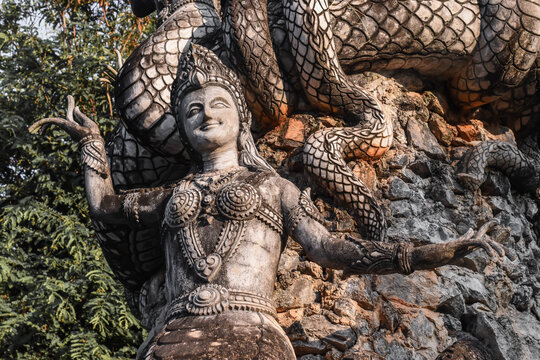 half Woman and snake statue name as Nakee at Sala Kaew Ku(sculpture park) in Nong Khai Province Thailand