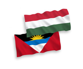 Flags of Antigua and Barbuda and Hungary on a white background