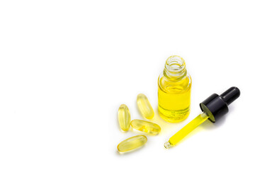  CBD cannabis oil. Hemp oil capsules on white background. medical marijuana concept.