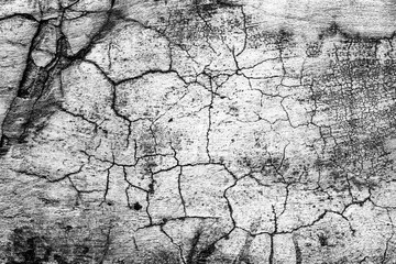 Texture of a concrete wall with cracks and scratches which can be used as a background