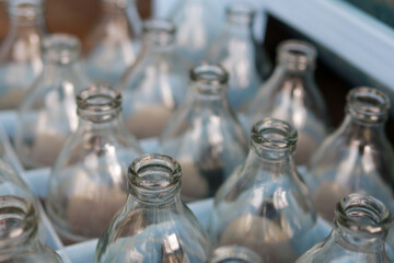 Glass bottle inside the container Waiting for the glass recycling process