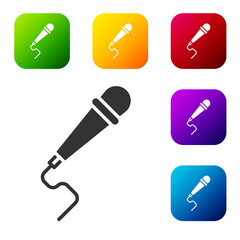 Black Microphone icon isolated on white background. On air radio mic microphone. Speaker sign. Set icons in color square buttons. Vector Illustration.