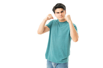 Fototapeta premium Angry Man Standing With Fist Defense Gesture