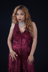 Fototapeta premium Pensive Hispanic woman looking serious